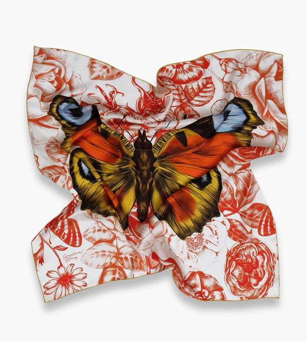 Röd/orange scarf med fjäril och blommor, något twistad
